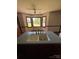 Well-lit kitchen sink area with large windows, perfect for enjoying natural light while preparing meals at 116 Lanes End Rd, Locust, NC 28097