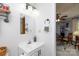 Well-lit half bathroom featuring a white vanity and modern fixtures at 118 Sunset Dr, Clover, SC 29710