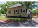 Side view of home featuring vinyl siding, garden area, and access to wood deck at 118 Sunset Dr, Clover, SC 29710
