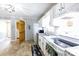 Cozy kitchen features white cabinets, granite countertops, and modern appliances at 118 Sunset Dr, Clover, SC 29710