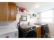 Convenient laundry room with modern washer and dryer, plus storage shelves and counter space at 118 Sunset Dr, Clover, SC 29710