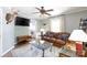 Inviting living room area with wood flooring, a flat screen television and comfortable furniture at 118 Sunset Dr, Clover, SC 29710