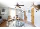 Bright living room with wood floors, neutral walls, traditional furnishings, and plentiful windows at 118 Sunset Dr, Clover, SC 29710
