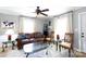 Cozy living room featuring comfortable seating, a ceiling fan, and plenty of natural light at 118 Sunset Dr, Clover, SC 29710