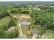 Expansive property with a beautiful home, pastures, and wooded areas all within defined yellow borders at 1230 Long Creek Ln, Salisbury, NC 28146