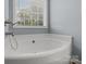 Large soaking tub and neutral paint found in this bathroom at 1230 Long Creek Ln, Salisbury, NC 28146
