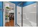 Bathroom featuring a glass enclosed shower and storage shelving at 1230 Long Creek Ln, Salisbury, NC 28146
