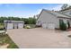 Exterior of the house features an extra parking lot, basketball hoop, and a storage shed at 1230 Long Creek Ln, Salisbury, NC 28146