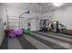 Spacious garage with gym equipment and a work out area at 1230 Long Creek Ln, Salisbury, NC 28146