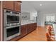 Modern kitchen highlighting stainless steel appliances, ample countertop space, and hardwood flooring at 1230 Long Creek Ln, Salisbury, NC 28146