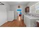 Spacious laundry room featuring appliances, cabinets, and ample countertop space at 1230 Long Creek Ln, Salisbury, NC 28146