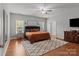 Bright main bedroom featuring hardwood floors, neutral walls, and ample closet space at 1230 Long Creek Ln, Salisbury, NC 28146