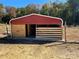 View of a backyard shed with adjacent fenced in area at 1230 Long Creek Ln, Salisbury, NC 28146