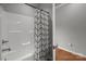 Walk-in shower with a sleek design and glass door next to a linen closet at 1230 Long Creek Ln, Salisbury, NC 28146