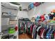 Walk-in closet with custom shelving, hanging rods, and organized storage solutions at 1230 Long Creek Ln, Salisbury, NC 28146