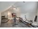 Spacious home gym with rubber flooring, ceiling fan, treadmill, rower, bike and plenty of room for activities at 1305 Yellowood Ct, Rock Hill, SC 29732