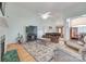 Bright living room featuring a fireplace, hardwood floors, and a comfortable seating area at 1305 Yellowood Ct, Rock Hill, SC 29732