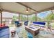 Relax in style on this screened-in porch, complete with comfortable seating and a cozy fire table at 1305 Yellowood Ct, Rock Hill, SC 29732