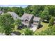 Overhead shot of home on lush private lot with convenient circular driveway and well-maintained landscaping at 132 Flora Vista Dr, Mooresville, NC 28117