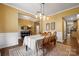 Elegant dining room with hardwood floors, neutral walls, and bright decor at 132 Flora Vista Dr, Mooresville, NC 28117
