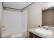Well-lit bathroom featuring a tub shower and a granite countertop vanity sink at 1380 St. Johns Church Rd, Concord, NC 28025
