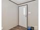 Bright entryway with modern flooring, paneled front door, and neutral walls at 1380 St. Johns Church Rd, Concord, NC 28025