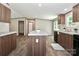 Spacious kitchen with island, black appliances and open to living area at 1380 St. Johns Church Rd, Concord, NC 28025