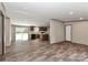 View of open kitchen with modern cabinets and wood-look floors at 1380 St. Johns Church Rd, Concord, NC 28025