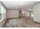 Bright living room with modern flooring, neutral walls, large windows and plenty of natural light at 1380 St. Johns Church Rd, Concord, NC 28025