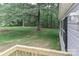Spacious yard featuring a wooden deck and lush green lawn at 1380 St. Johns Church Rd, Concord, NC 28025