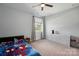 Spacious bedroom with a window, ceiling fan, dresser, and lots of space at 1437 Imperial Ct, York, SC 29745