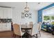 The dining area is adjacent to the kitchen and features a modern light fixture at 1437 Imperial Ct, York, SC 29745