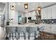 Bright kitchen features white cabinets, quartz countertops, and stainless steel appliances at 1437 Imperial Ct, York, SC 29745