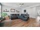 Spacious living room featuring hardwood floors, modern decor, and ample natural light at 1437 Imperial Ct, York, SC 29745