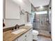 Well-appointed bathroom with granite counters, a glass shower, and modern fixtures for a spa-like experience at 14505 Sunset Walk Ln, Huntersville, NC 28078