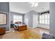 Spacious bedroom features ample storage, plantation shutters and hardwood floors with lots of light at 14505 Sunset Walk Ln, Huntersville, NC 28078