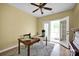 Well-lit home office with hardwood floors and access to a private balcony with natural light at 14505 Sunset Walk Ln, Huntersville, NC 28078