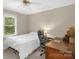 Bedroom with neutral colors, a ceiling fan, and a large window to allow for natural light at 151 Deja Ln, Cleveland, NC 27013