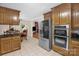 Well-equipped kitchen with stainless steel appliances and an adjacent dining area at 151 Deja Ln, Cleveland, NC 27013