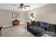 Inviting living room with cozy seating, neutral walls, and a wooden accent table at 151 Deja Ln, Cleveland, NC 27013