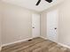 Comfortable bedroom with a ceiling fan, featuring neutral colors and great closet space at 16 Green St, York, SC 29745