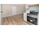 Modern kitchen with stainless steel oven, white countertops and open access to living room at 16 Green St, York, SC 29745