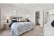 A bedroom with a desk and an ensuite bathroom at 162 Nicholson Ln, Mooresville, NC 28115