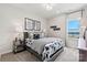 A stylish bedroom offers lots of natural light and unique artwork at 162 Nicholson Ln, Mooresville, NC 28115