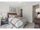 Cozy bedroom with soft lighting, neutral decor, and comfortable furnishings at 162 Nicholson Ln, Mooresville, NC 28115