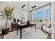 Modern home office with large window, stylish light fixture, and contemporary decor at 162 Nicholson Ln, Mooresville, NC 28115