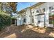 Back of house with a fenced-in yard and stone paver patio at 165 N Arcadian Way, Mooresville, NC 28117