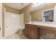 Bathroom featuring a tub/shower, toilet, vanity and ceramic tile floors at 165 N Arcadian Way, Mooresville, NC 28117