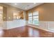 Dining area with hardwood floors and large window for natural lighting at 165 N Arcadian Way, Mooresville, NC 28117