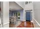 Foyer featuring the front door and dining room at 17318 Cambridge Grove Dr, Huntersville, NC 28078